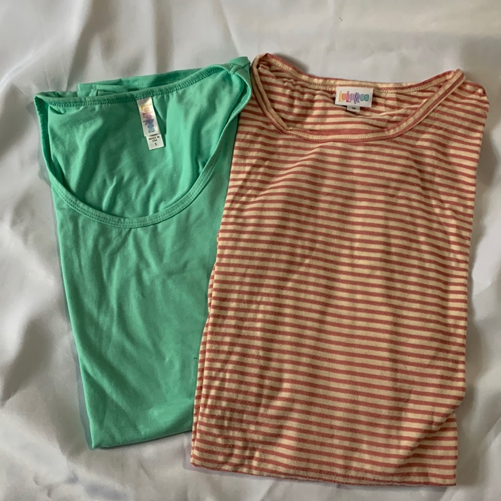 LuLaRoe-2 tunics size Small but fit like a Large.